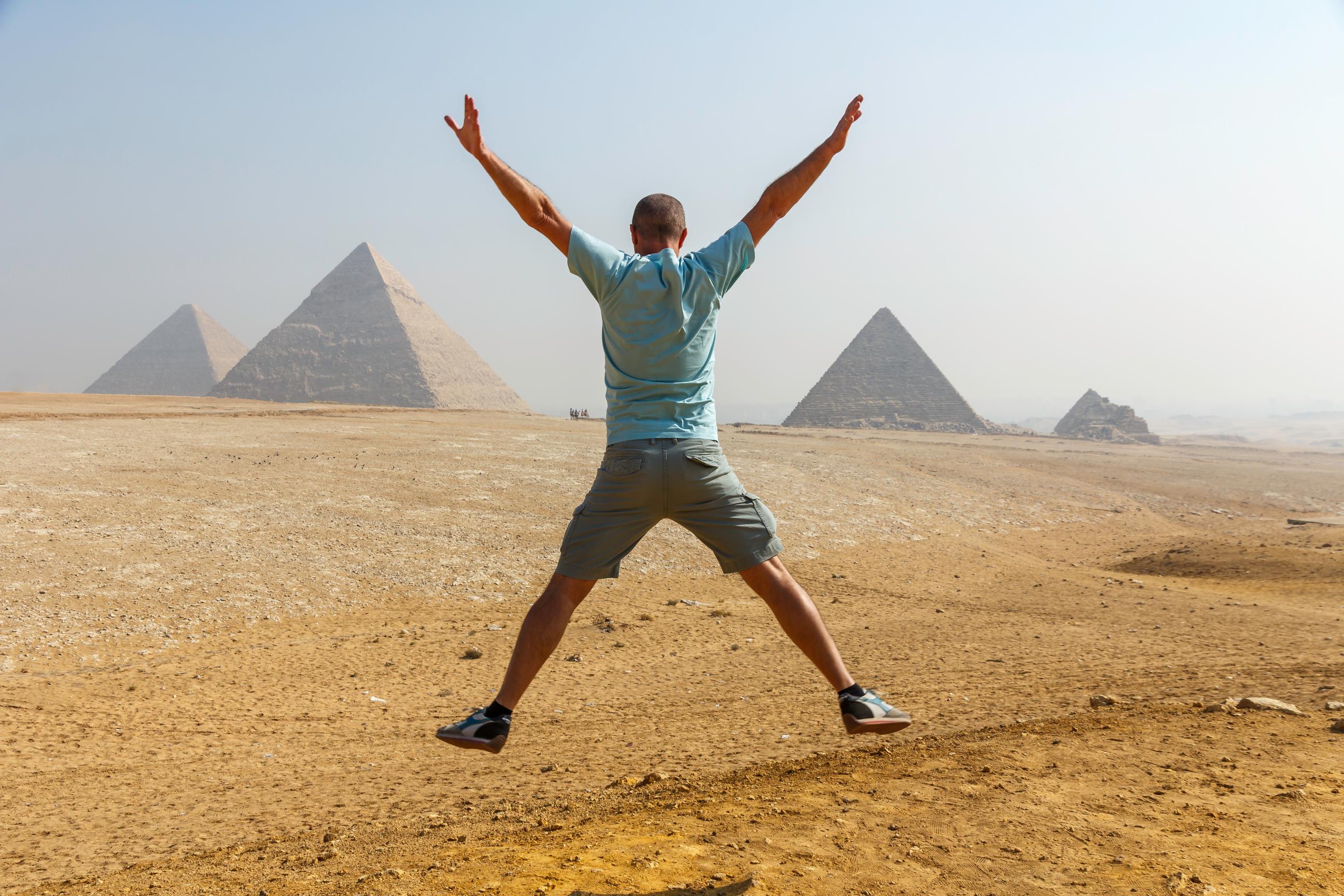 man-jumping-at-pyramids-of-giza